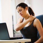 woman feeling neck and shoulder pain due to stress